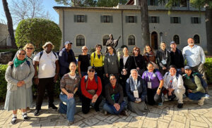 Sharon Sherwood and 2025 pilgrim group shot