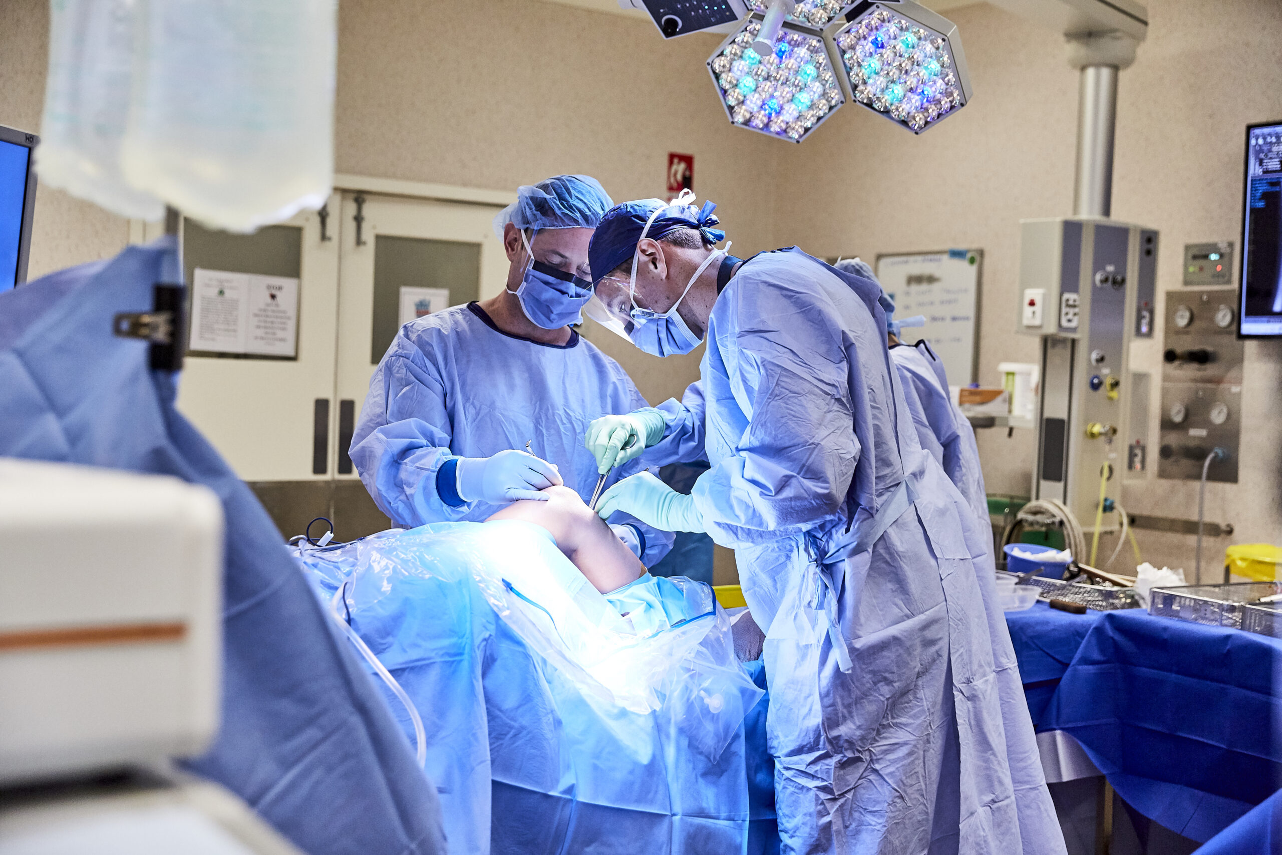 Surgeon performing a total knee replacement operation