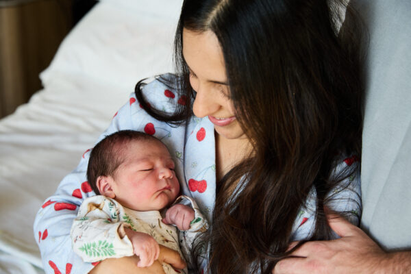 Cabrini - mum holding new baby