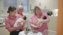 Cabrini midwives holding babies