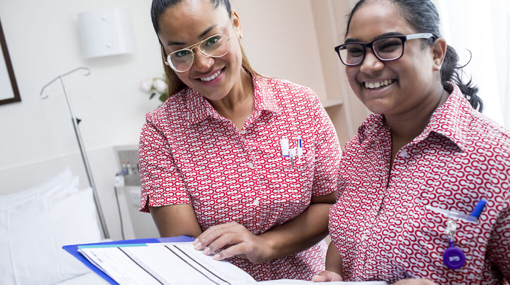 Cabrini Orthopaedic nurses reviewing a patients file