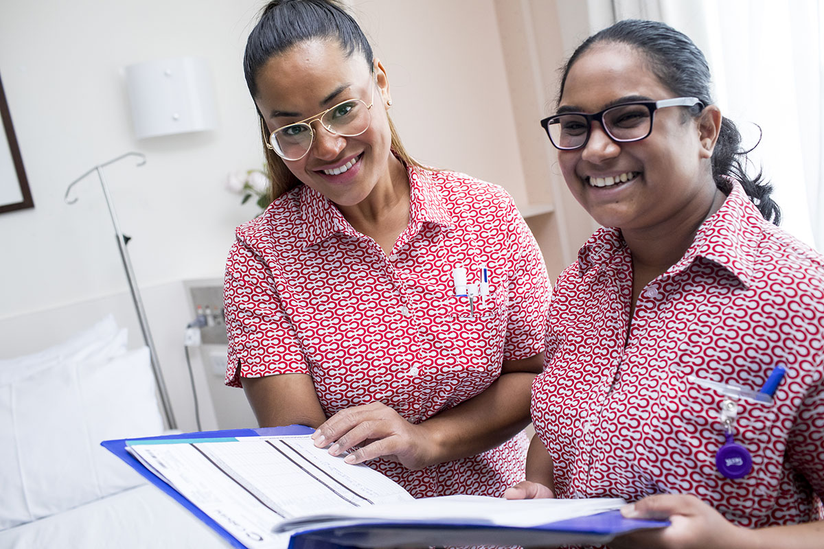 Cabrini Orthopaedic nurses reviewing a patients file